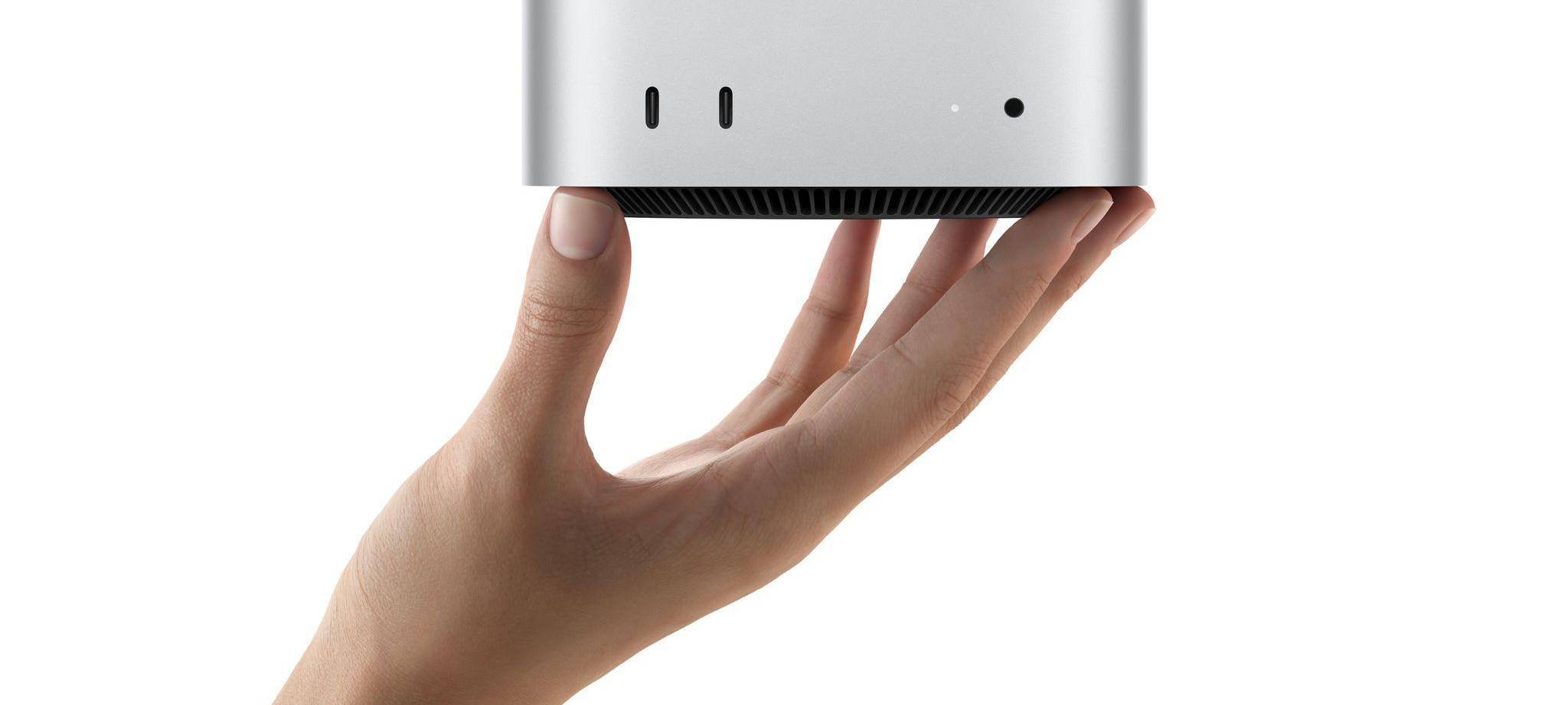 Der neue Apple Mac mini in einer Hand